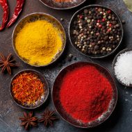 Colorful spices on stone table. Top view